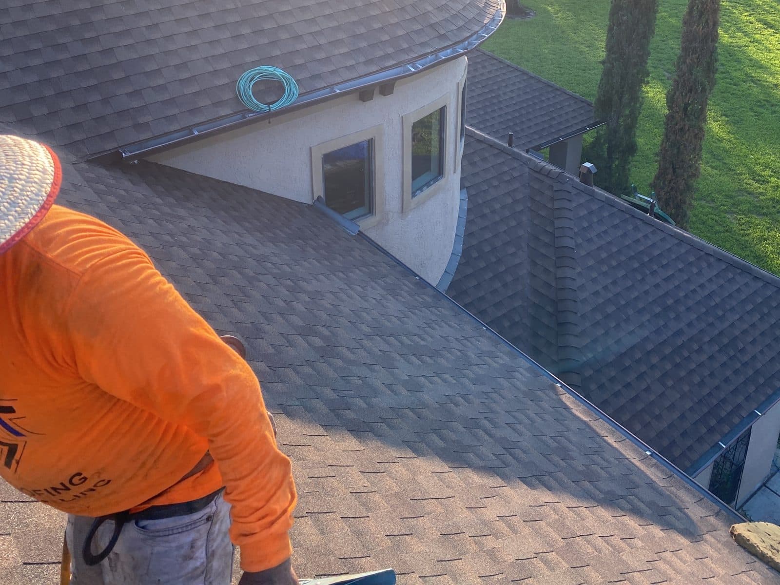 True Line inspector on a shingle roof
